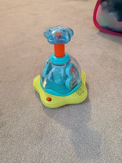 Bright Starts Press and Glow spinner