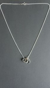 Sterling silver double heart necklace with real diamond accent