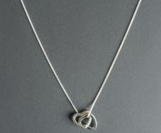 Sterling silver double heart necklace with real diamond accent