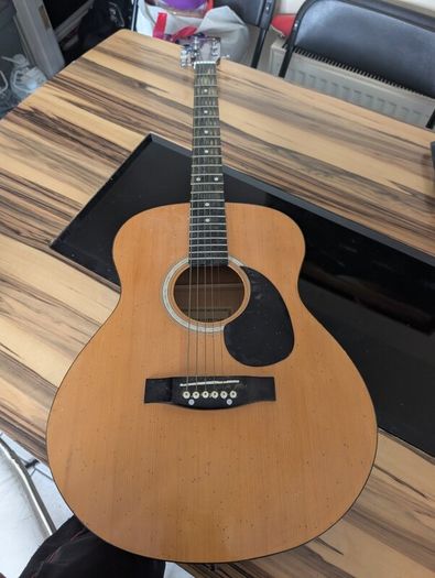 Three acoustic guitars