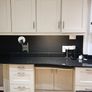 kitchen cabinets and black marble countertop Image 2