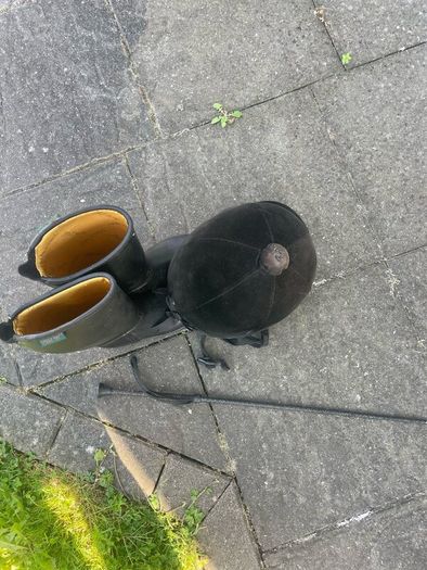 Childs horse riding helmet, boots and whip