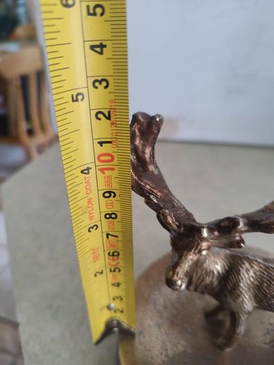 Vintage Brass effect Deer on circle base.