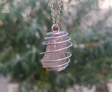 Nice genuine 925 Sterling Silver Wire Cage Pendant Necklace holding a natural Polished Smoky Quartz Crystal Gemstone