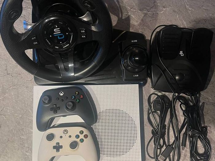 X-Box 1s with steering wheel and peddles