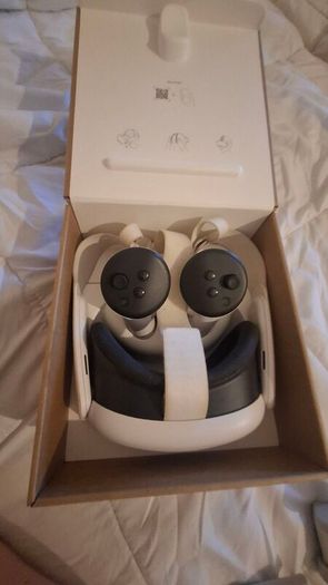 meta quest 3 with controllers and earmuffs, all working good condition