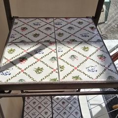 Decorative metal shelving unit with tiles