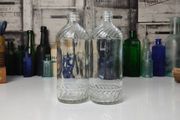 328 - Set of 2 Vintage Clear Glass Collectible Decorative Swirls Bottles