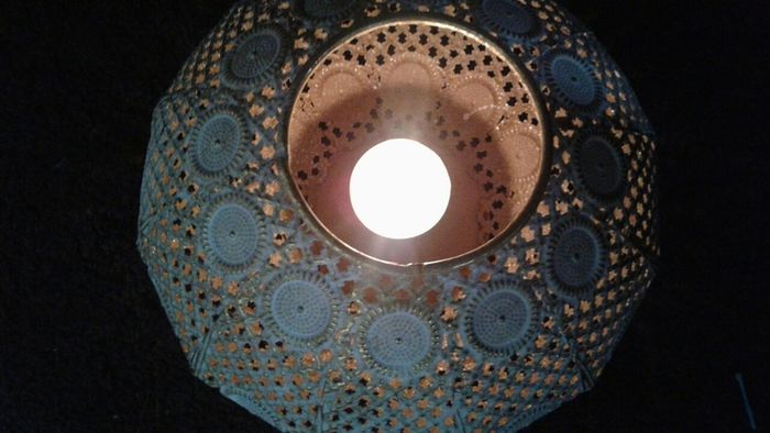 Decorative metal candle holder
