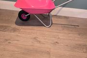 kids pink wheelbarrow