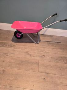 kids pink wheelbarrow