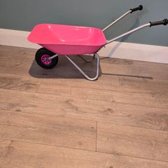 kids pink wheelbarrow