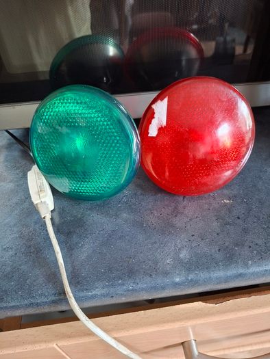Large Theatrical or Display Lighting, including reflector lamps and colored PAR-style bulbs, with various lamp holders, plugs, and coiled electrical leads all working