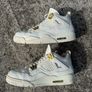 Air Jordan 4 White and Gold Trainers Image 4