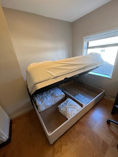 Double bed  - ottoman-style side-opening with storage