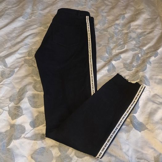 Black stretchy jeans with white stripes, size S, like new
