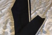 Black stretchy jeans with white stripes, size S, like new
