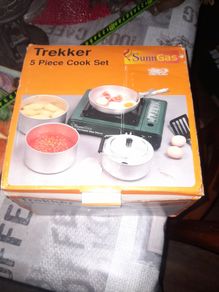 Trekker five piece Aluminum used Camping Cook Set by SunnGas in box, comprising 17cm saucepan, 18cm saucepan, 19cm frying pan, 16cm kettle (1.5L), and detachable grip handle. , Postage Available on all my Items or Collection in Rochfortbridge Westmeath