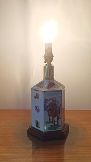 Vintage "Pointers of London & Edinburgh" porcelain  table lamp with wooden base and horse racing theme  height 30cm