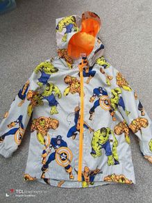 NEW.boy's light rain jacket. Age 6/7