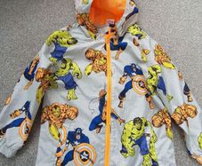 NEW.boy's light rain jacket. Age 6/7