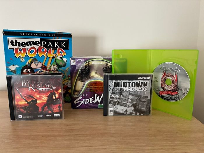 Mixed PC gaming lot: official Sidewinder controller and games, incl. big-box Theme Park World