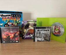 Mixed PC gaming lot: official Sidewinder controller and games, incl. big-box Theme Park World
