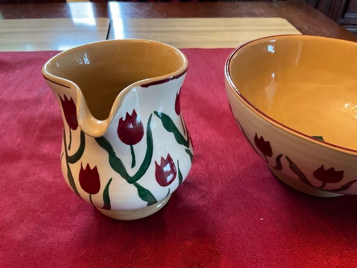 Nicholas Mosse Red lawn set of two , 4 inch jug and a 6 inch diameter bowl . Both have blemishes but perfect for  display