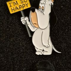 Droopy dog,  pin back badge.