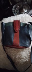 Leather bag crossbidy or shoulder ( adjustable strap.r bottle green tan and red .Real leather .used once like new.