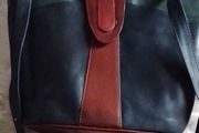 Leather bag crossbidy or shoulder ( adjustable strap.r bottle green tan and red .Real leather .used once like new.