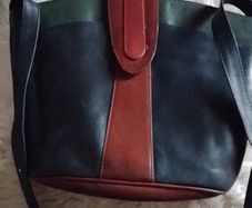 Leather bag crossbidy or shoulder ( adjustable strap.r bottle green tan and red .Real leather .used once like new.