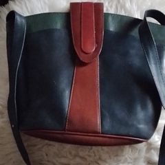 Leather bag crossbidy or shoulder ( adjustable strap.r bottle green tan and red .Real leather .used once like new.