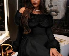Black dress with fur on collar and cuffs
