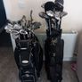 A selection of golf clubs and bags. Image 6