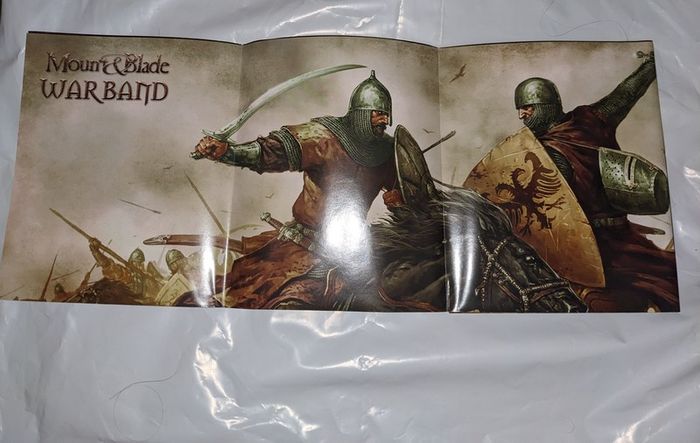 Gaming posters, manuals, DLC codes, art, post cards