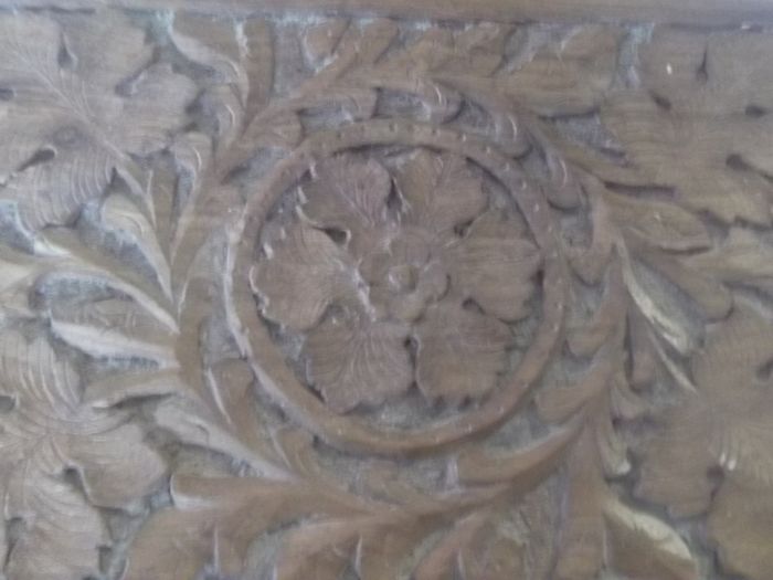 a antique carved wooden box