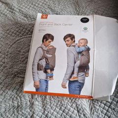baby carrier , sling