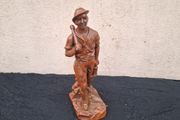 Plaster mine worker statue