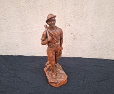 Plaster mine worker statue