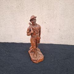 Plaster mine worker statue