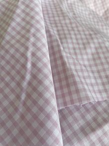 Over 20 m x 1.1 m of a pretty pink lilac gingham check fabric