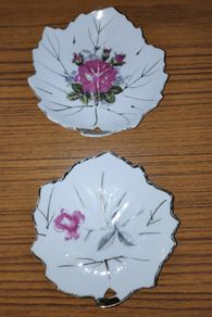 2 leaf shaped with gilt trim porcelain trinket dishes, marked Foreign