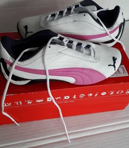 New pink white and navy junior puma trainers