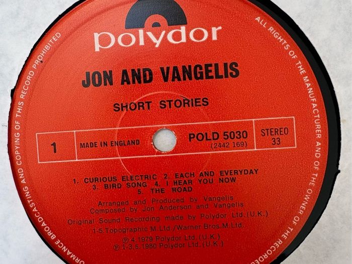 John and Vangelis - Short Stories LP. 1979 UK first pressing. Plays perfectly but no cover. Bargain!
