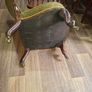 A Victorian Walnut upholstered Nursing Chair c1860 nicely Carved with Cabriole legs. It has Brass Castors. Image 8