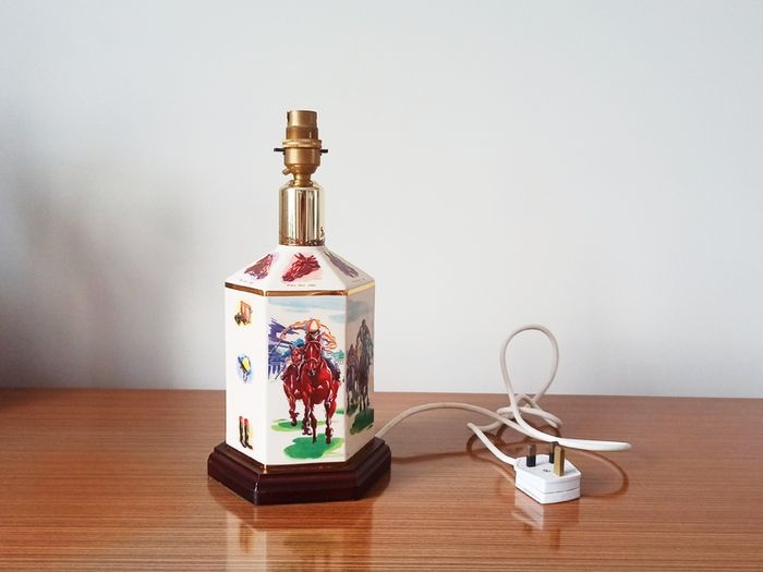 Vintage "Pointers of London & Edinburgh" porcelain  table lamp with wooden base and horse racing theme  height 30cm