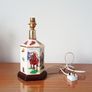 Vintage "Pointers of London & Edinburgh" porcelain  table lamp with wooden base and horse racing theme  height 30cm Image 2