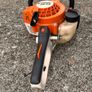 STIHL HS 45 petrol hedge trimmer with 24-inch double-sided cutting blade. Image 3