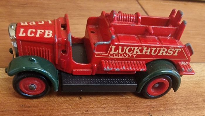 4 vintage toy cars -
